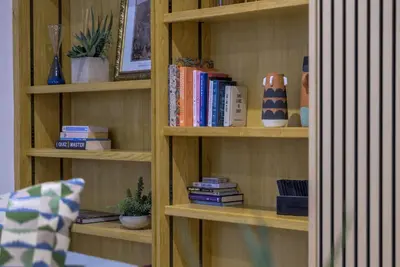 a book shelf filled with books and books at Moss Crag in Penrith