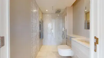 a bathroom with a shower and a toilet and a sink at 2b2b skyline flat&amazing view! in Moffat