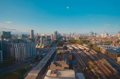 a view of a city with train tracks and buildings at 2b2b skyline flat&amazing view! in Moffat