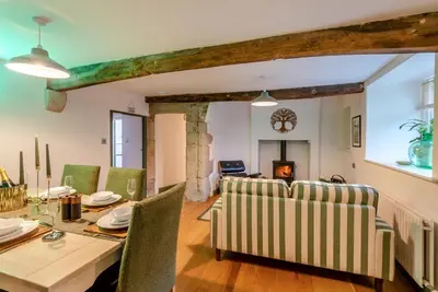 a dining room with a table and chairs at 3 Bed in Caldbeck oc-h30704 in Caldbeck