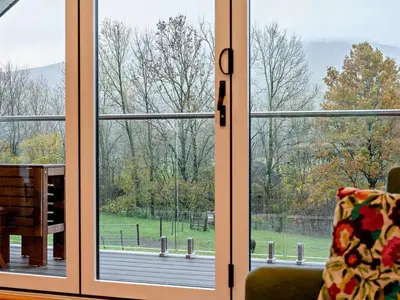 a window with a view of a wooden deck at 3 Bed in Keswick oc-93589 in Threlkeld