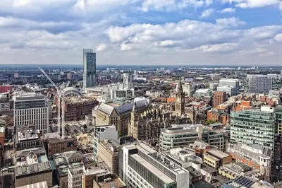 an aerial view of a large city with buildings at New Stylish Large 1-Bed Apartment - Close to Old Trafford & More in Moffat