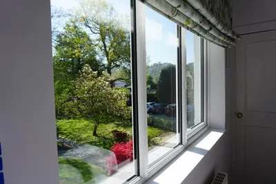 a window with a view of a yard at Lake View Country House and Self-catering Apartments in Grasmere