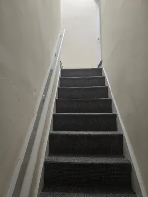 a set of stairs in a building at Carlton road in Moffat