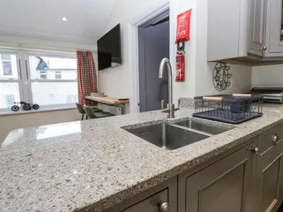 a kitchen with a sink and a counter top at Sunnycroft in Keswick