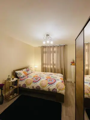 a bedroom with a bed and a window at Bow Church in Moffat
