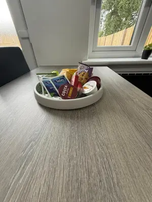 a plate of food sitting on a table at Home Comfort Prestwick in Prestwick
