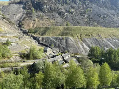 a building on the side of a mountain at Swirral Edge Cottage in Penrith