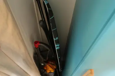 a pair of skis are hanging on a wall at The Biscuit Box Ideal For Couples Or Families in Low Hesket