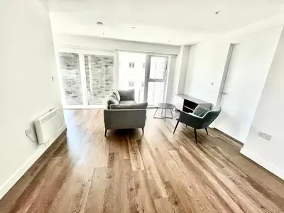 a living room with a couch and two chairs at Blucher St in Moffat
