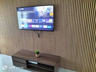 a flat screen tv hanging on a wall at Quiet 5BR Ideal for Groups in Moffat