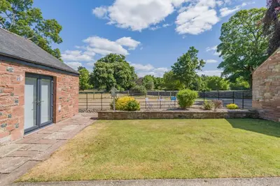 a brick house with a garden in the yard at 1 Bed in Dalston oc-s32206 in Dalston
