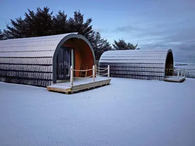 a couple of large domed buildings with a door at Keith - Uk49287 in Stranraer