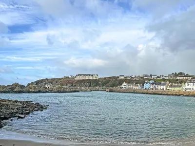 a large body of water with houses on a hill at Keith - Uk49287 in Stranraer