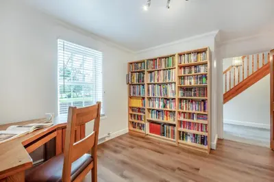 a home office with two book shelves filled with books at 5 Bed in St. Bees oc-w32446 in St Bees