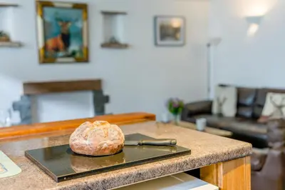 a loaf of bread sitting on a tray on a counter at 1 Bed in Troutbeck oc-l32563 in Troutbeck