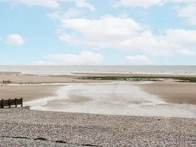 a view of the beach from the shoreline at Puffin in St Bees