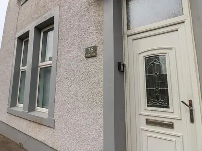 a door to a building with a sign on it at Ennerdale Edge in Cleator