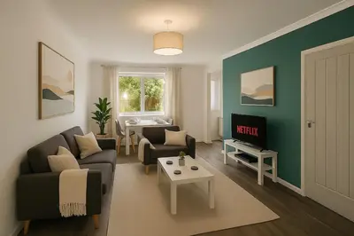 a living room with a couch and a table at Near West Cumbria Hospital in Whitehaven