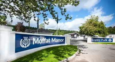 a sign for a motorott marriott dealership at Moffat Manor Holiday Resort in Beattock