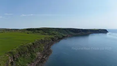 an aerial view of a large body of water at Coastal Haven - Steps From Beach in Whitehaven