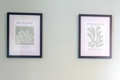 three framed prints of plants on a wall at 2 Bed, Ground Floor Flat, Carlisle in Carlisle