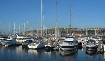 a bunch of boats docked in a harbor at Birks Terrace - 2 Bedroom - Sleeps 4 in Cleator Moor