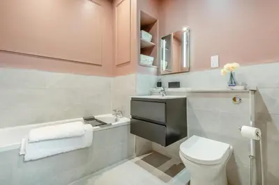 a bathroom with a toilet and a sink and a tub at 2 Bed in Cockermouth oc-m32942 in Cockermouth