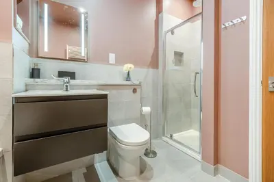 a bathroom with a toilet and a sink and a shower at 2 Bed in Cockermouth oc-m32942 in Cockermouth