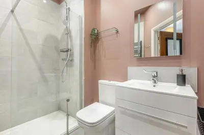 a bathroom with a toilet and a sink and a shower at 1 Bed in Cockermouth oc-h32941 in Cockermouth