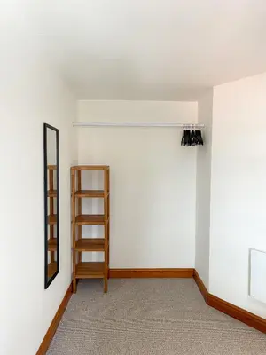 an empty room with a ladder and a mirror at Borders Retreat, Cosy 1 Bed Flat - 3miles from M6 Jct45 - near A75, Gretna & Carlisle in Longtown
