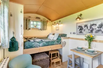 a small room with a bed and a table at 1 Bed in Keswick oc-f33118 in Bassenthwaite