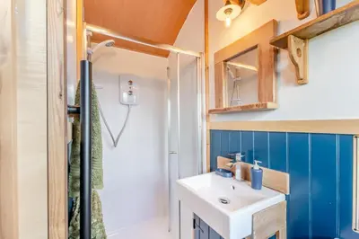 a bathroom with a sink and a shower at 1 Bed in Keswick oc-f33118 in Bassenthwaite