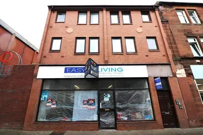 a store front of a brick building at Cosy 1 bed flat in central Ayr in Ayr