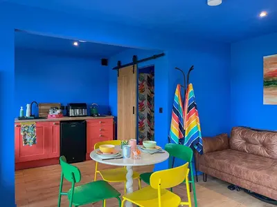 a living room with a table and chairs and a couch at Cassiopeia - Uk50360 in Castle Douglas