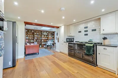 a kitchen with a stove and a dining room at 4 Bed in Ellonby oc-y33284 in Ellonby