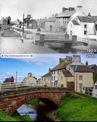 a black and white photo of a bridge over a river at Old Post Office By The Sea in Allonby