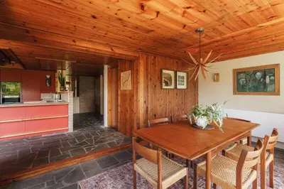 a kitchen and dining room with a wooden ceiling at The Hideaway at Yew Trees, Ullswater in Watermillock