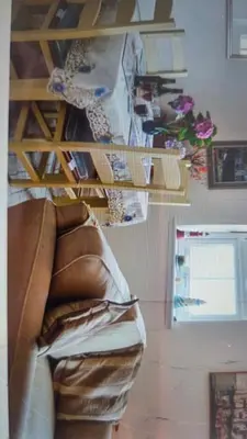 a room with a pile of pillows on a shelf at Ocean View in Port William