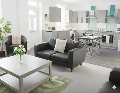 a living room with a couch and a table at Esk View House in Carlisle