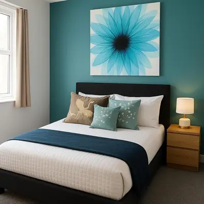 a bedroom with a bed with pillows and a blue wall at Harrington Haven - 4bed Home Workington in Workington