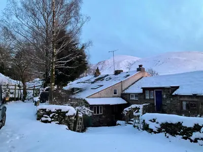 a house with snow on the roof of it at 2 Bed in Wigton oc-b34112 in Caldbeck