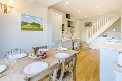 a kitchen and dining room with a table and chairs at 3 Bed in Waberthwaite oc-n34154 in Waberthwaite