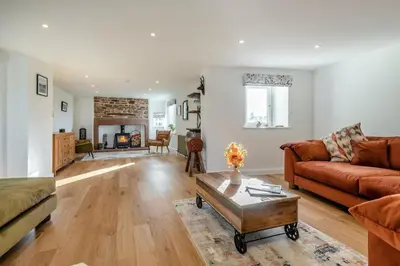 a living room with a couch and a coffee table at 3 Bed in Wigton oc-f33746 in Westward