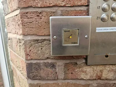 a metal switch on the side of a brick wall at Carlisle Stunning 2 Bed Appt with Parking 5 mins J42 M6 in Carlisle