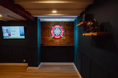 a room with a wall with a sign on it at Bankhouse in Troon