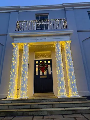 a house with a christmas wreath on the front door at Bankhouse in Troon