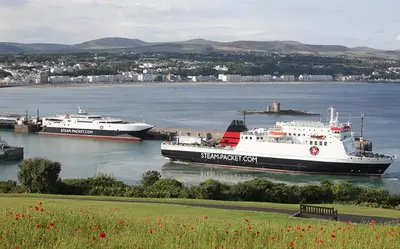 two ships are docked in a body of water at Bed And Blueberry Two Bed Suite for 2,3, or 4 people in Douglas