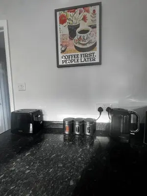 a counter top with three coffee pots and a picture on the wall at Oakleigh Way, Carlisle - 2 Bedroom, sleeps 4, Fully furnished in Carlisle
