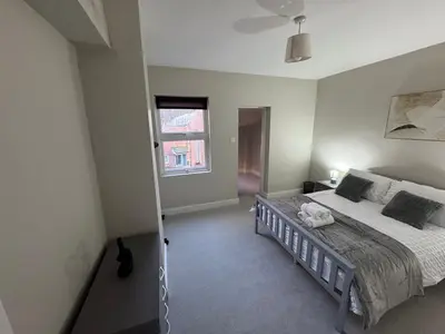 a bedroom with a bed and a window at Work-Ready House Near Sellafield in Cleator Moor